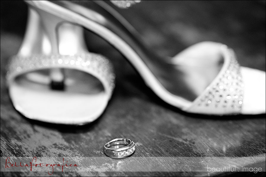 Bridal shoes and grooms wedding ring