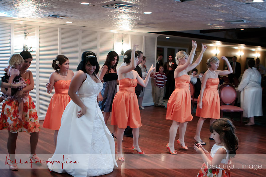 bride and bridesmaids dancing