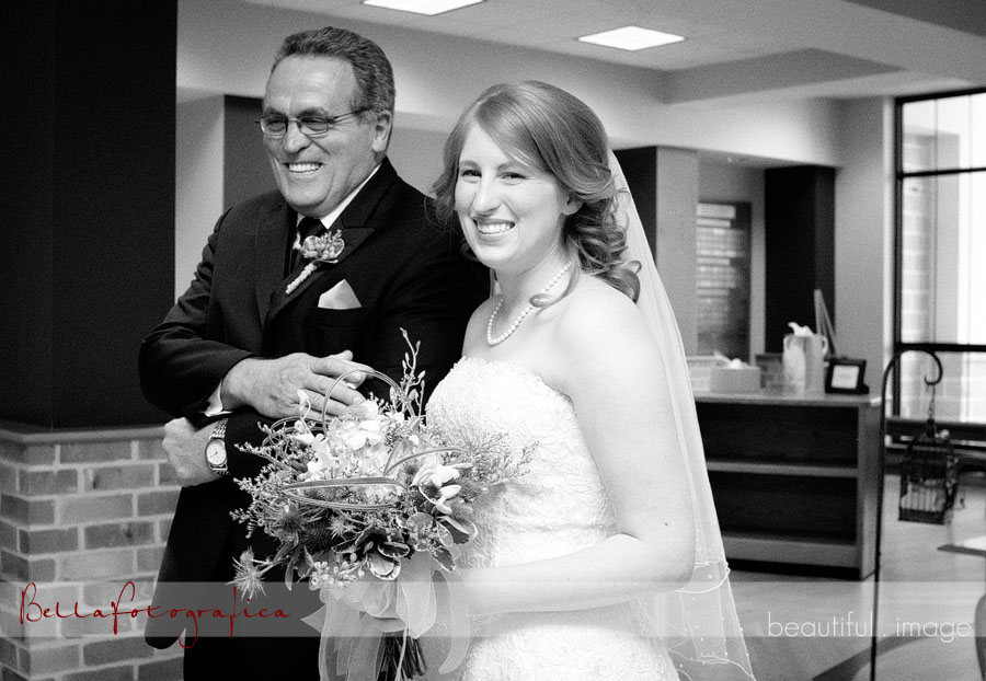 bride and her dad about to walk down the aisle