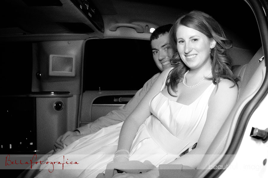 bride and groom in the limousine