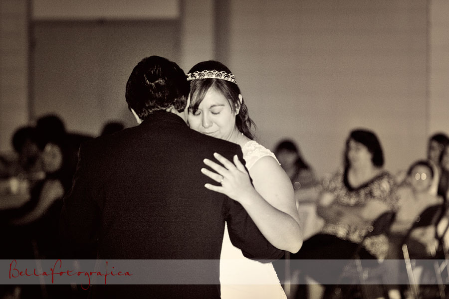 black and white photo of dad and bride dancing at the reception
