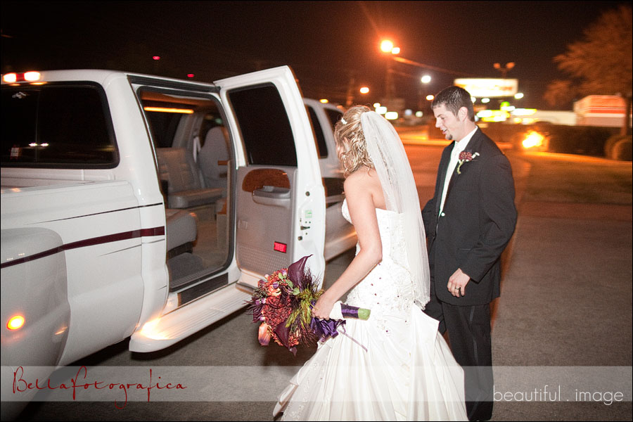 bride and groom get into limo