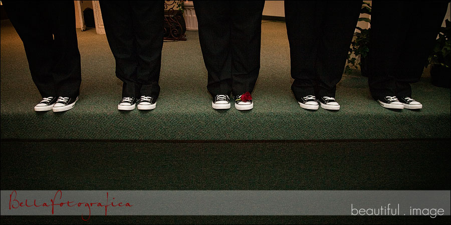 groom and groomsmen wearing converse tennis shoes