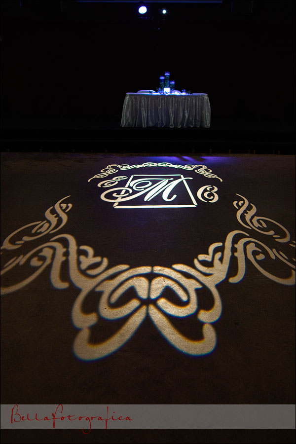 light monogram on the floor of the wedding reception