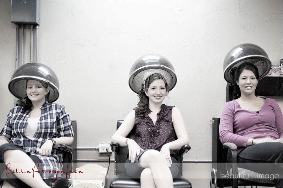 bride and bridesmaids under the hair dryer