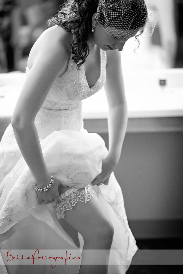 bride adjusting garter