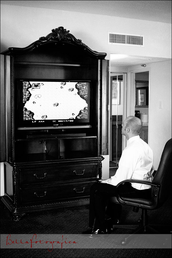 groom playing video games