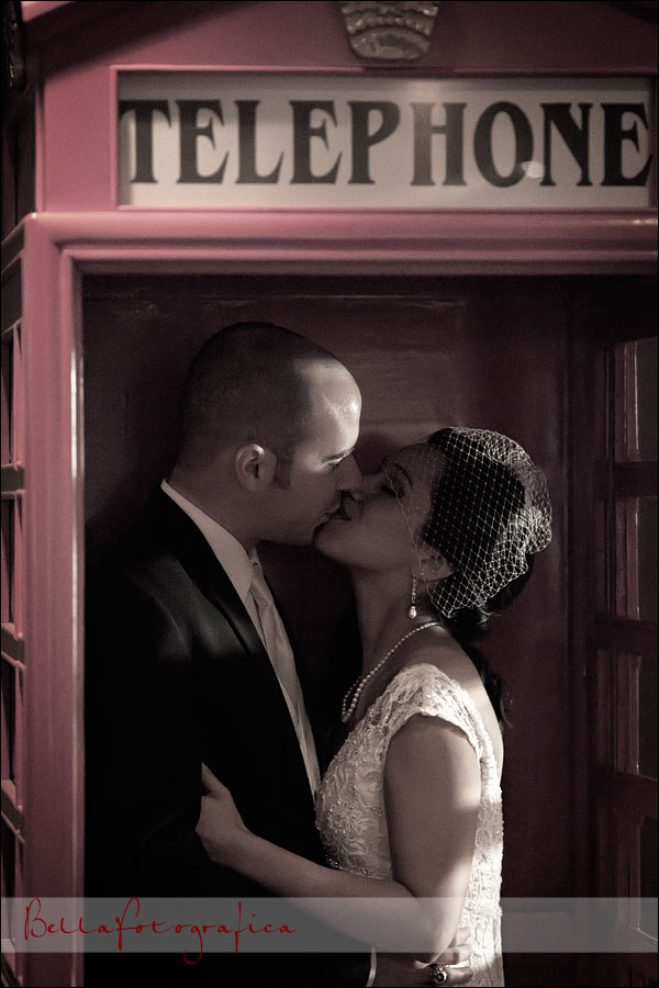 bride and groom in a telephone booth