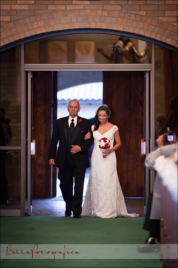 bride and dad walk up the aisle