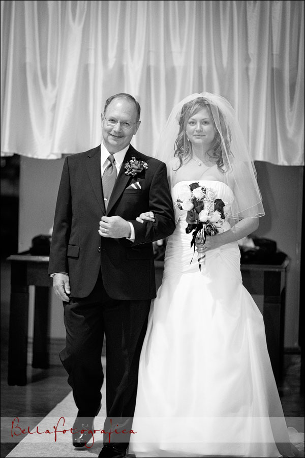 bride and her father walking up the aisle
