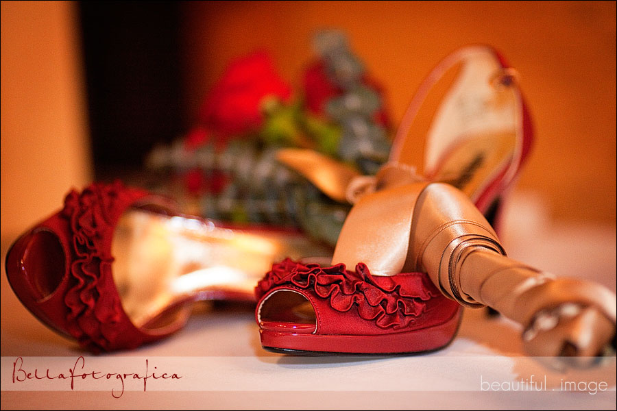 brides red shoes and bouquet