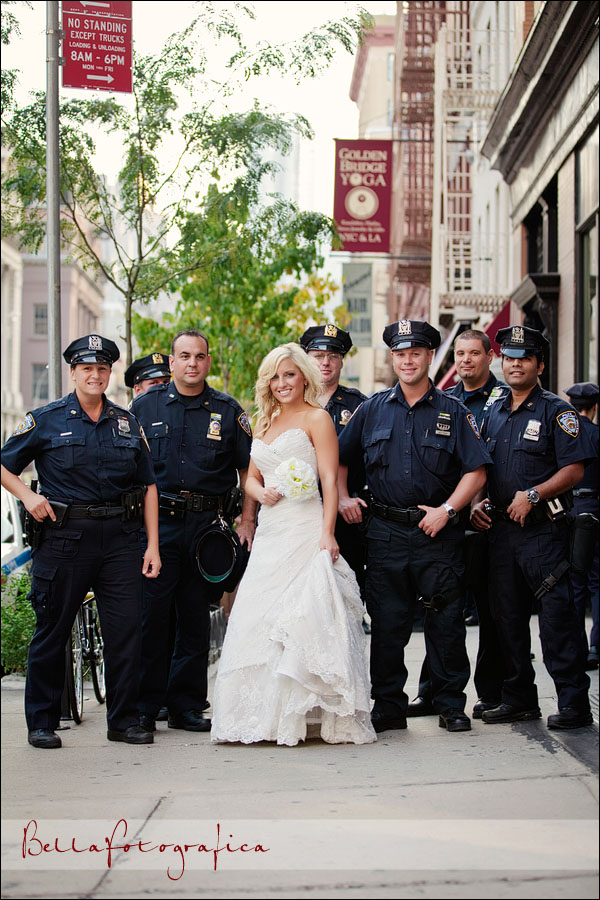 bride getting photo taken with NYC police