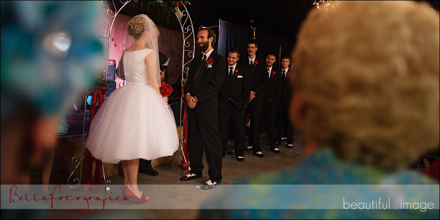 groomsmen and bridesmaids singing and dancing during the ceremony