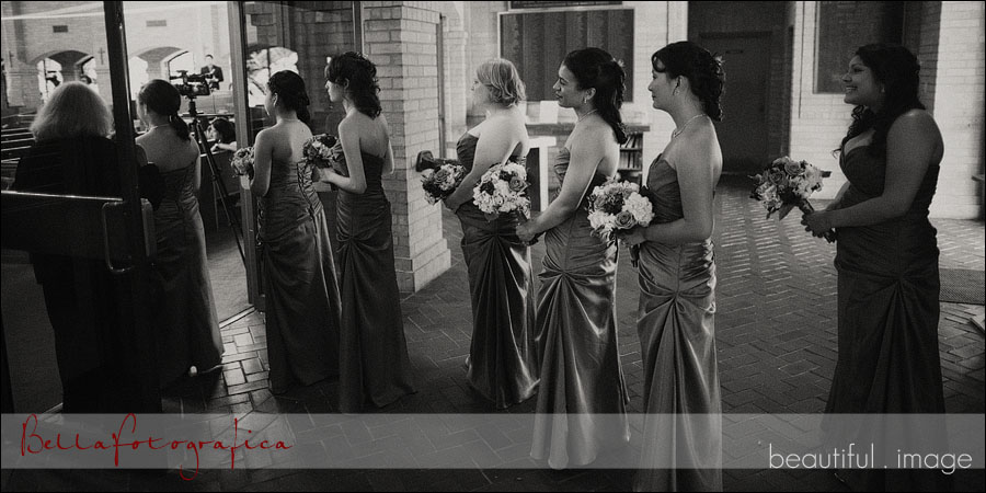 bridesmaids lined up at wedding ceremony