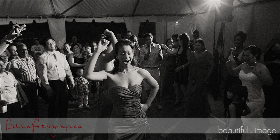 bridesmaids dancing at outdoor tented wedding reception