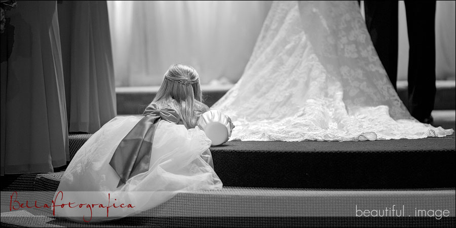 flowergirl laying down on altar