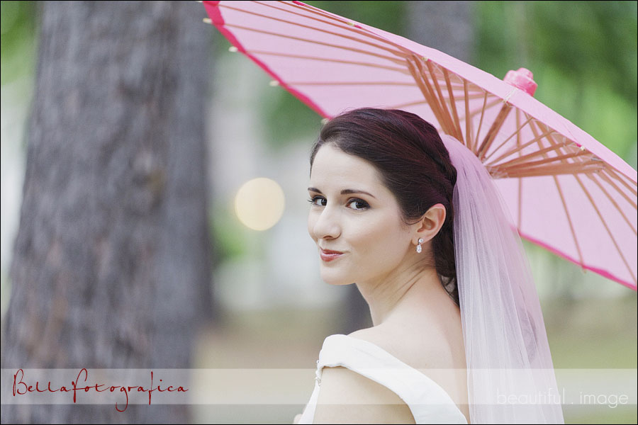 outdoor bridal photos with pink parasol