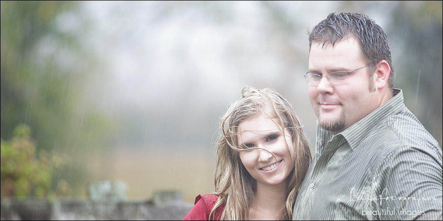 outdoor engagement photos in the rain